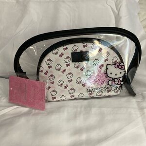 Hello kitty Clutch Set. NEW W/ TAGS! Clear Clutch plus Cosmetic bag. Cute!